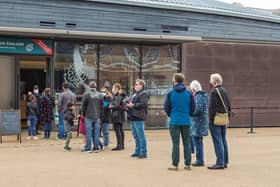 Queues form outside the Mary Rose Museum. Picture: Mike Cooter (220521)