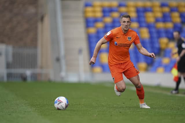 Lee Brown in action against AFC Wimbledon