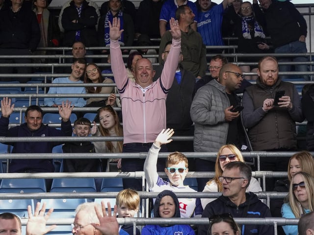 Pompey fans played a big role in carrying their team to a massive three points in their Championship survival battle against Blackburn Rovers.