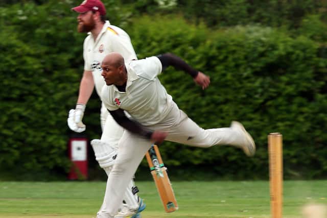 Kerala skipper Dawn Ambi bowling against Gosport Borough 2nds. 
Picture: Chris Moorhouse