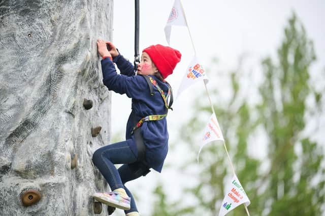 Cub Scout climbing