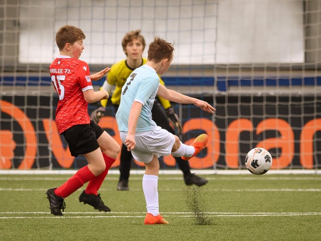 Action from the Portsmouth Youth League Geldard Invitation Cup final between Jubilee 77 U13s and Castle United U13s (light blue and white kit). Picture: Keith Woodland (190321-501)