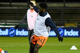 Jordy Hiwula (26) of Portsmouth warming up ahead of the EFL Sky Bet League 1 match between Bristol Rovers and Portsmouth at the Memorial Stadium, Bristol, England on 16 February 2021.