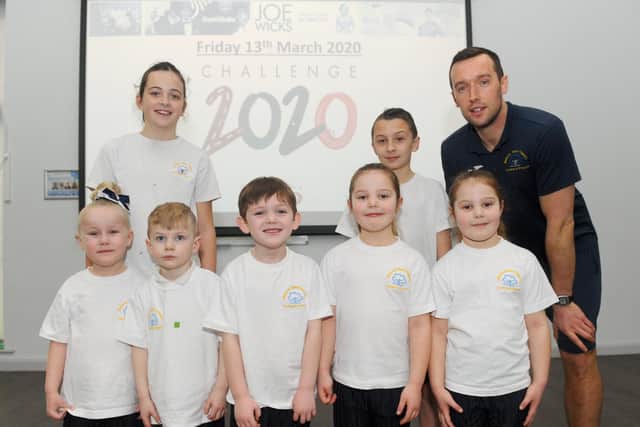 Back from left, Anya Roach, 11, Jayden Johnsey, 11, PE lead Matthew Lyttle with front, from left, Demi Freshney, five, Harley Bright, five, Leyton Veness, four, Nevaeh Small, five, and Charley Small, five at Beacon View Primary Academy.
Picture: Sarah Standing (130320-7220)