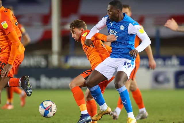 Former Pompey midfielder Charlie Bell in action against Peterborough in the Papa John's Trophy last season. Picture: Nigel Keene/ProSportsImages