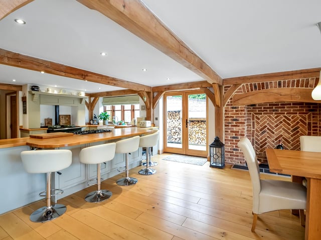 This five bedroom detached house is on the market at a £950,000 guide price. It is listed by Fine and Country.