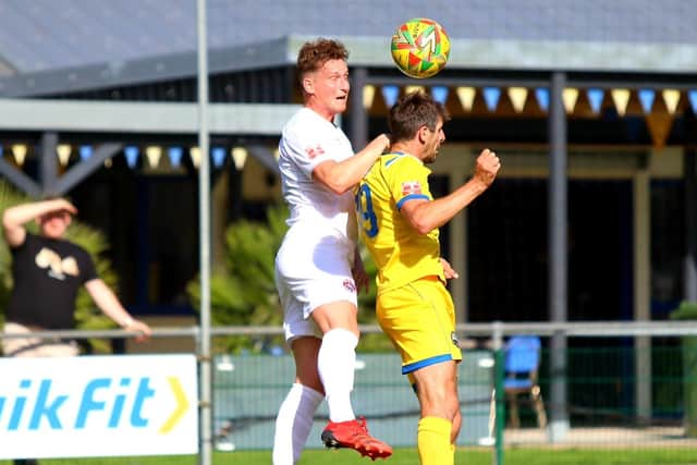 Danny Hollands, right, in action against Truro. Picture by Tom Phillips