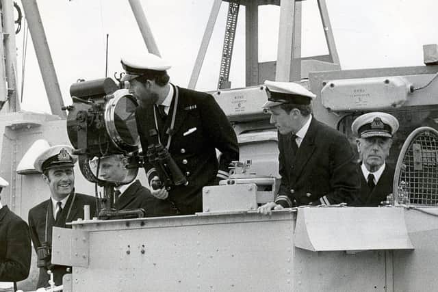Lord Mountbatten watches as Prince Charles brings his minehunter HMS Bronington alongside at HMS Vernon, Portsmouth,