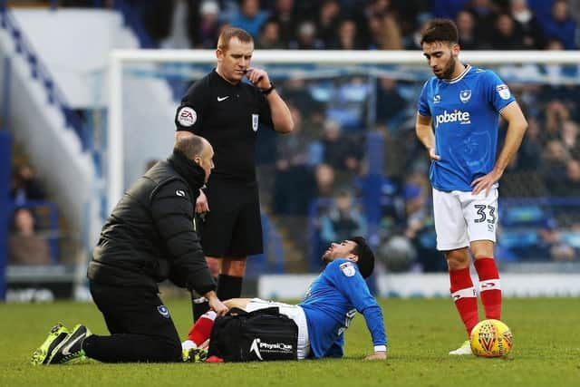 Danny Rose receives treatment after breaking his leg against Northampton in December 2017. Picture: Joe Pepler