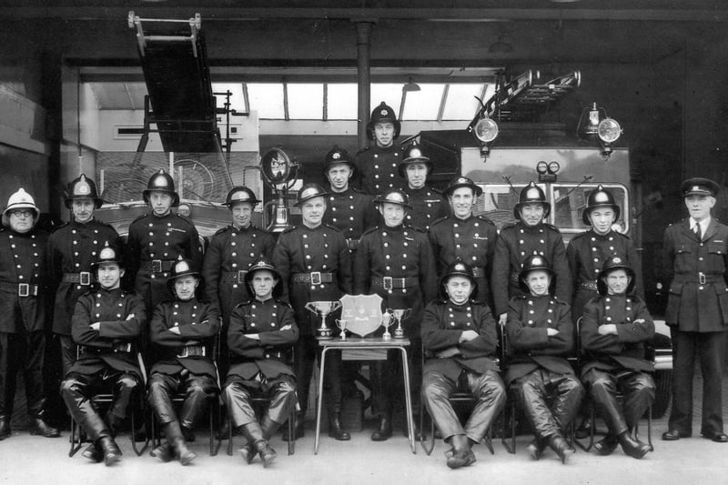 Fareham Firemen in the 1950's at West Street station (centre of town) in front of their appliances. Left: Leyland wheeled pump escape Right: Austin towing vehicle Firemen in photo are: Back: G O'Callanhan 2nd Back: J Birchell, N Smith 2nd row: E Hixman, N Hall, E Cathery, Wren, S Jenkins, B Forder, R Flake, B Mortar, B Edney, L Abbs Front row: J Male, H Johnson, J Frost, H Farley, P Dugan, H Stockwell.