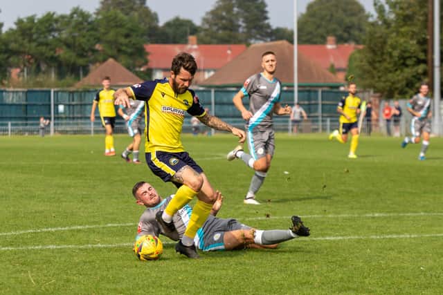 Borough striker Dan Wooden avoids a tackle. Picture: Mike Cooter