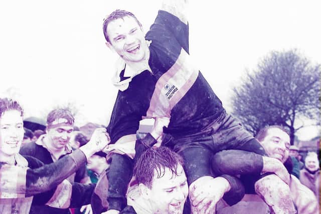 Steve Todd is hoisted in the air after Portsmouth had won promotion to London 1 South in 1994/95.