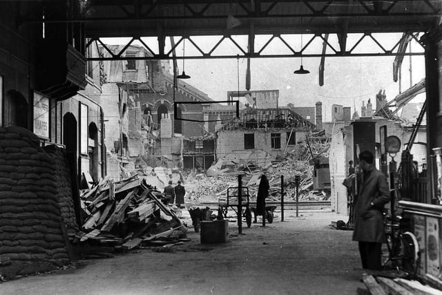 Although bombs caused destruction all around it, Portsmouth and Southsea railway station suffered comparatively little damage, apart from broken glass. this picture was taken in the station looking out to Station Street