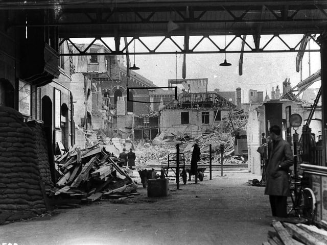 Although bombs caused destruction all around it, Portsmouth and Southsea railway station suffered comparatively little damage, apart from broken glass. this picture was taken in the station looking out to Station Street