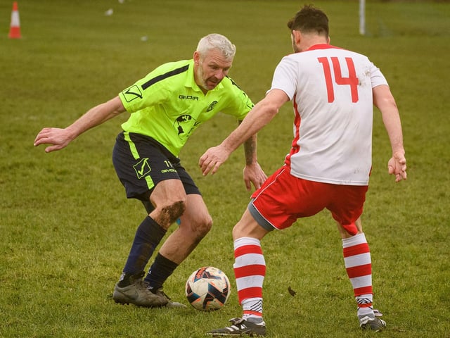 North End Vets' Phil Archbold, left. Picture: Keith Woodland