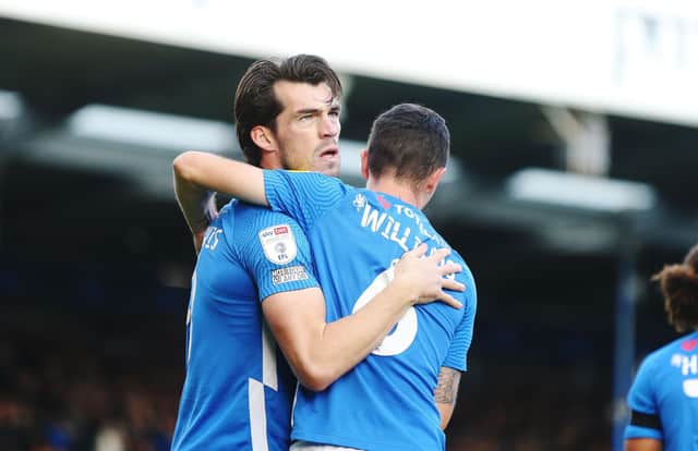 John Marquis celebrates scoring Pompey's winner.