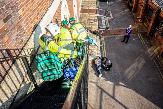 Emergency services exercise at Historic Dockyard, Portsmouth on Thursday 19th June 2025 Pictured: Actors around the aftermath of an improvised explosion in one of the buildings within the dockyard Picture: Habibur Rahman