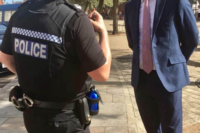 Stephen Morgan with police officer