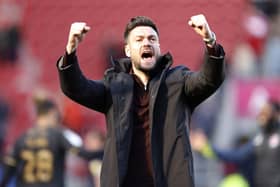 Charlton boss Johnnie Jackson celebrates Charlton's win at Rotherham. Photo credit should read: Richard Sellers/PA Wire.