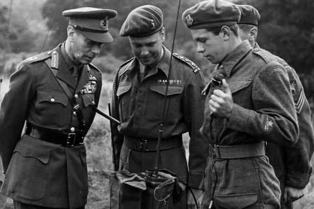 King George VI inspecting part of the Signal Platoon at Bourly Camp in 1948.  Picture: Portsmouth Grammar School archive.