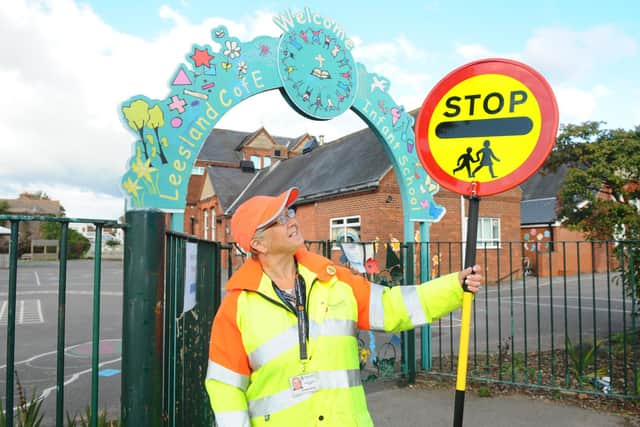 School patrol crossing officer Bridget Bathe (61) from Gosport, celebrated her 25th anniversary in the role on Thursday, October 15.

Picture: Sarah Standing (151020-5946)