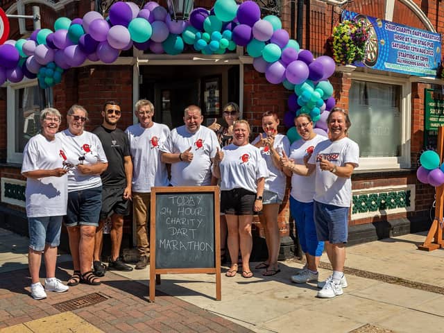 The darts team at The Stag ready to begin their 24 hour marathon.