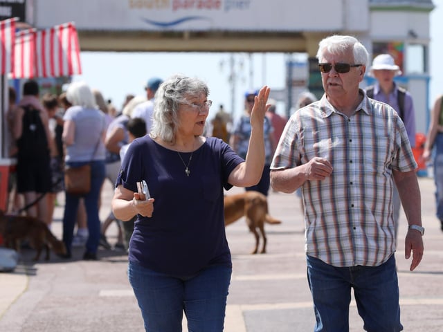 Rea and Steve Johnson enjoy a stroll on the promenade.