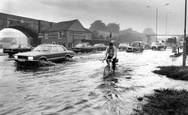 Flooding scene at Fareham in May 1979. The News PP382