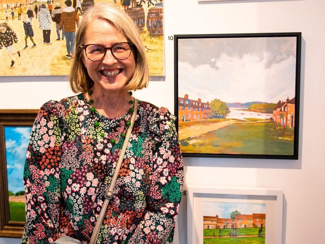 Runner-up Emma Lowres with her painting in The Art of Buckler's Hard exhibition