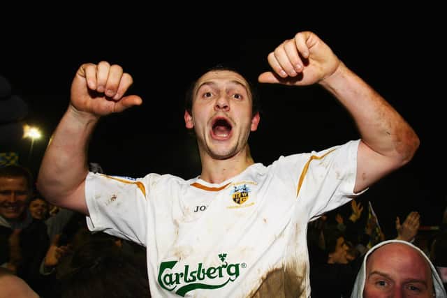 Shaun Wilkinson celebrates after Hawks' FA Cup win over Swansea City. Photo by Mike Hewitt/Getty Images.