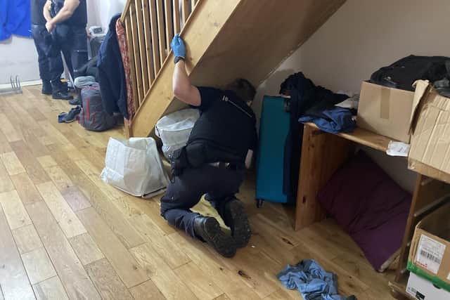 Immigration officers arrested five suspected illegal workers at a Stamshaw house and newsagents Twyford News. Pic Steve Deeks