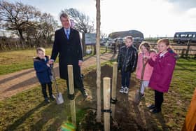 Queen Elizabeth II Platinum Jubilee Park at Daedalus, Lee-on-the-Solent - The Queen's Memorial Tree is planted with mulch using the flowers left by the public by Cllr Sean Woodward with Crofton Anne Dale School pupils
Picture: Habibur Rahman