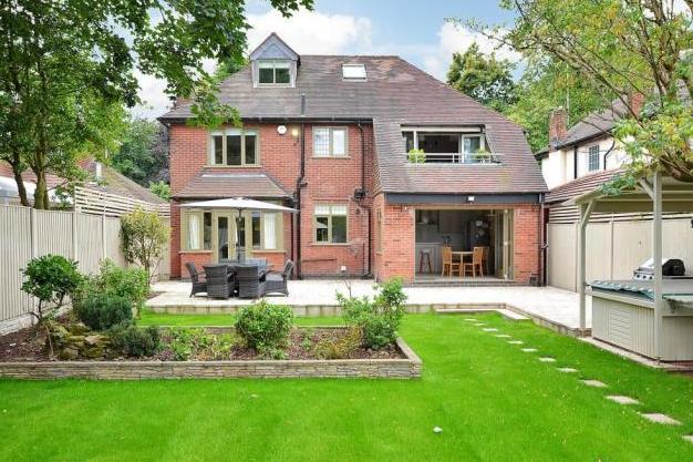 Back outside now and a view from the rear. It gives an idea of the spectacular appeal of the property, not to mention its stunning, lawned back garden