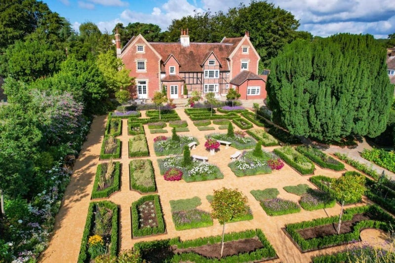 This property comes with five bedrooms, four bathrooms and six reception rooms.