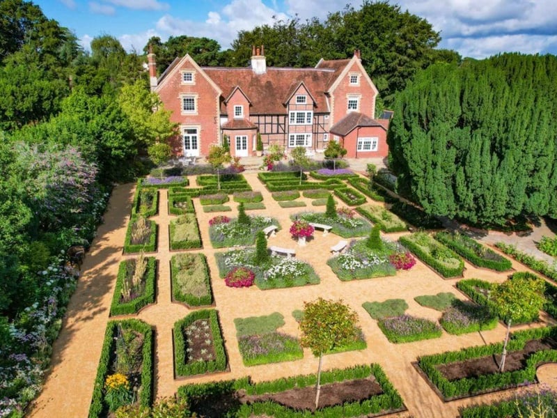 This property comes with five bedrooms, four bathrooms and six reception rooms.