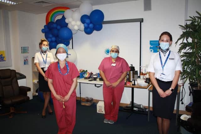 Project Wingman cabin crew volunteers with NHS staff at Queen Alexandra Hospital in Cosham.
