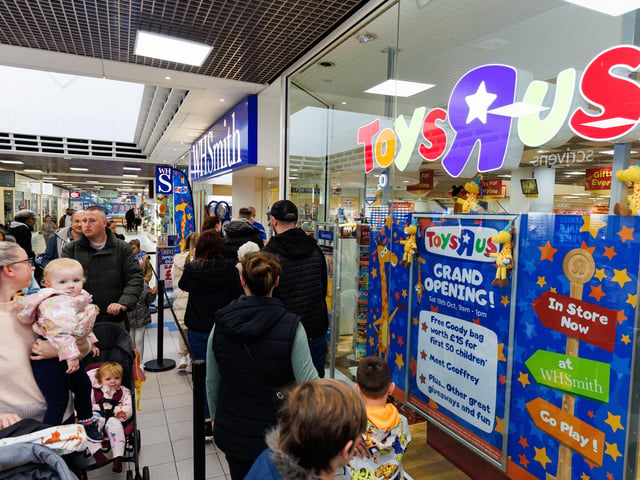 Families queued ahead of the opening of the store with the first 50 children receiving goodie bags.