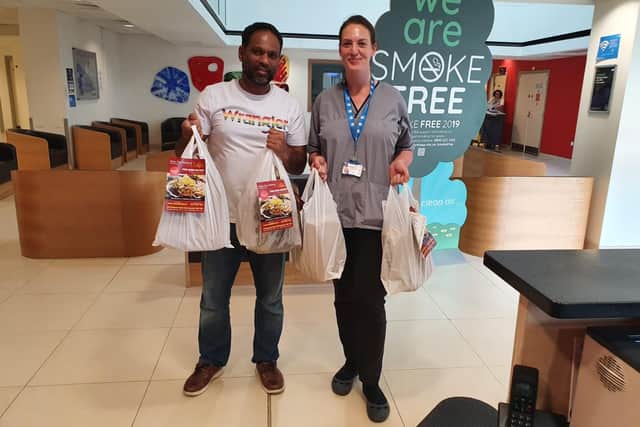 New Taj Mahal Indian takeaway in Buckland donated Iftar meals to Portsmouth hospitals as part of their charitable giving for Ramadan and to give thanks to key workers. Pictured: Owner Salim Miah donating 100 curries to Queen Alexandra Hospital last month
