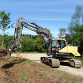 The trees are being relocated as part of the project to create the water reservoir