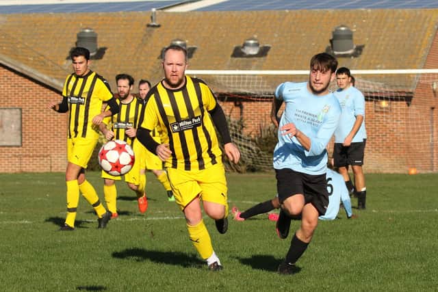 Co-Op Dragons (yellow/black) v AFC Eastney. Picture: Kevin Shipp