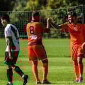 James Cowan, middle, is congratulated after one of his goals at Alresford. Picture by Daniel Haswell.