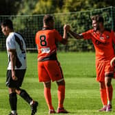 James Cowan, middle, is congratulated after one of his goals at Alresford. Picture by Daniel Haswell.