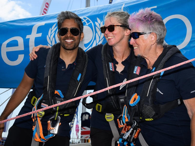 UNICEF team members celebrate reaching the end.Picture: Keith Woodland (270721-21)