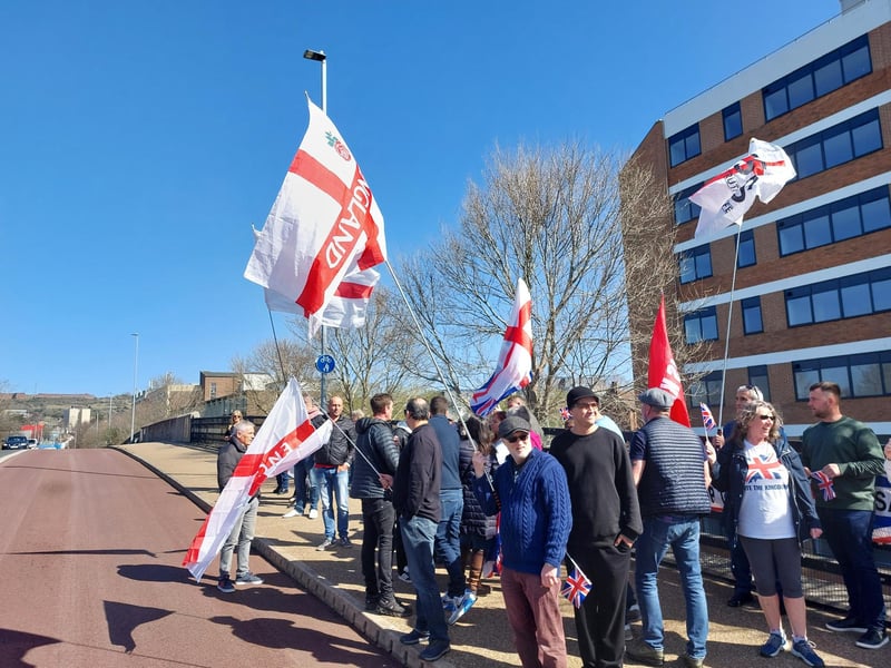 Illegal immigration protestors gathered outside Roebuck House in Cosham on Sunday, March 30.