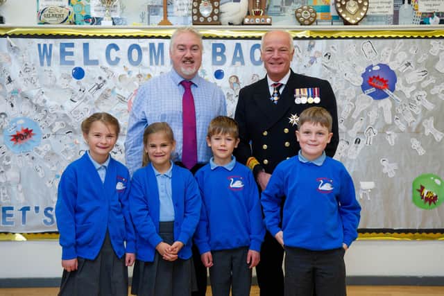Surgeon Rear Admiral Lionel Jarvis with some of the Swanmore Primary School pupils, Isla, Lila, Jack and Freddie with headteacher John Paterson
Picture: Habibur Rahman