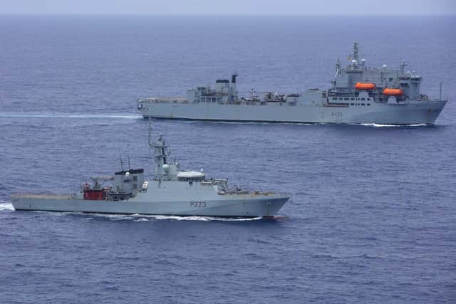 RFA Argus, front,  meets up with HMS Medway in the Caribbean in the waters near the Cayman Islands