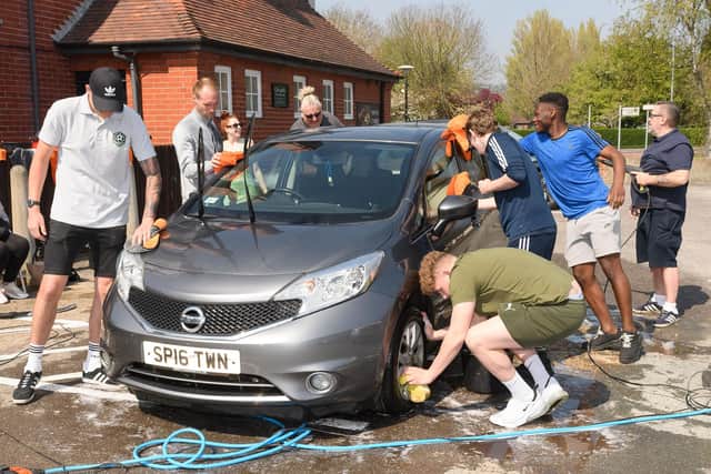 Players from AC Copnor football team helped raise money for Ukraine by washing cars
Picture: Keith Woodland (160421-3)