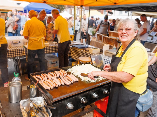Pictured: Sausages served by Ann Stevens from Meon Valley Lions Club Picture:Marcin Jedrysiak