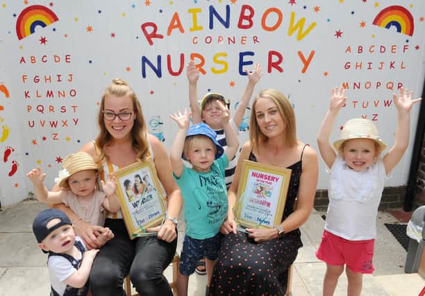 Lucy Whitehead with children and staff at the Rainbow Corner Day Nursery in Southsea.

Picture: Sarah Standing (050719-2801)