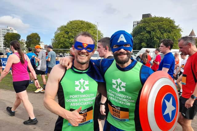 Mark Miller, right, with friend Simon Aellan, ran the Great South Run in support of Portsmouth Down Syndrome Association. Picture: David George
